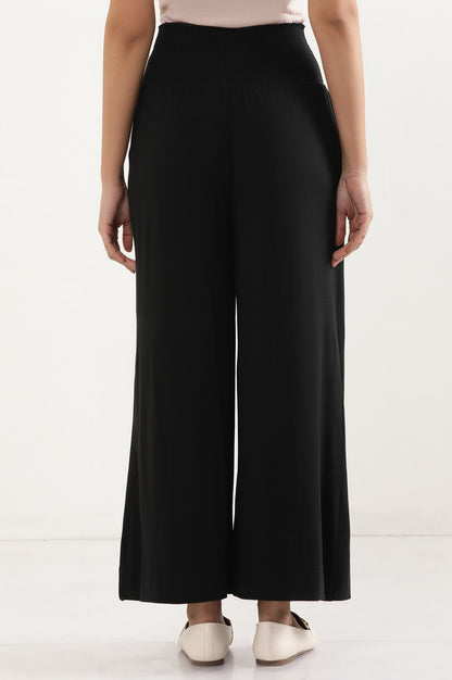 Black Solid Flared Pants With Smocked Waistbelt