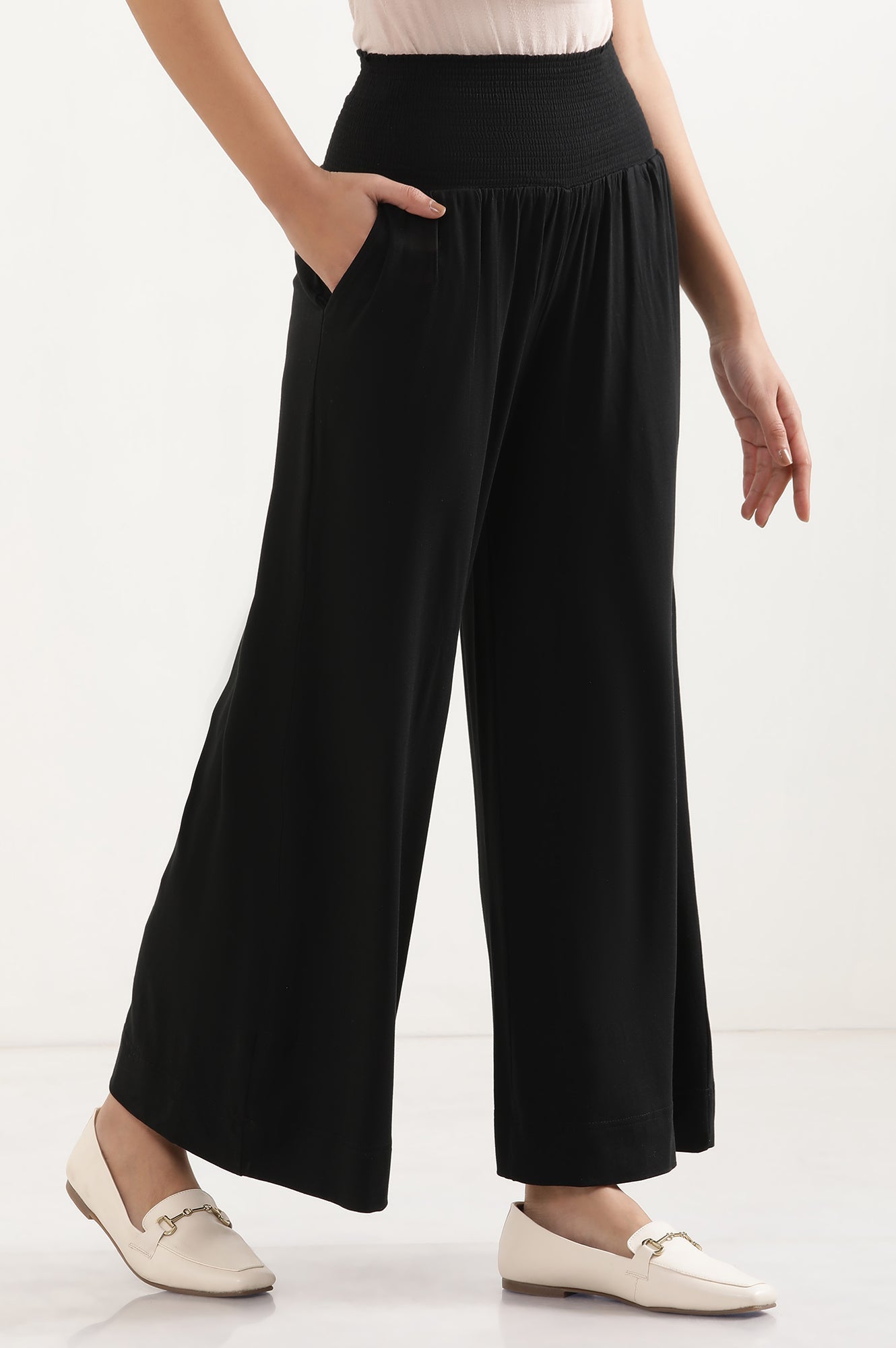 Black Solid Flared Pants With Smocked Waistbelt