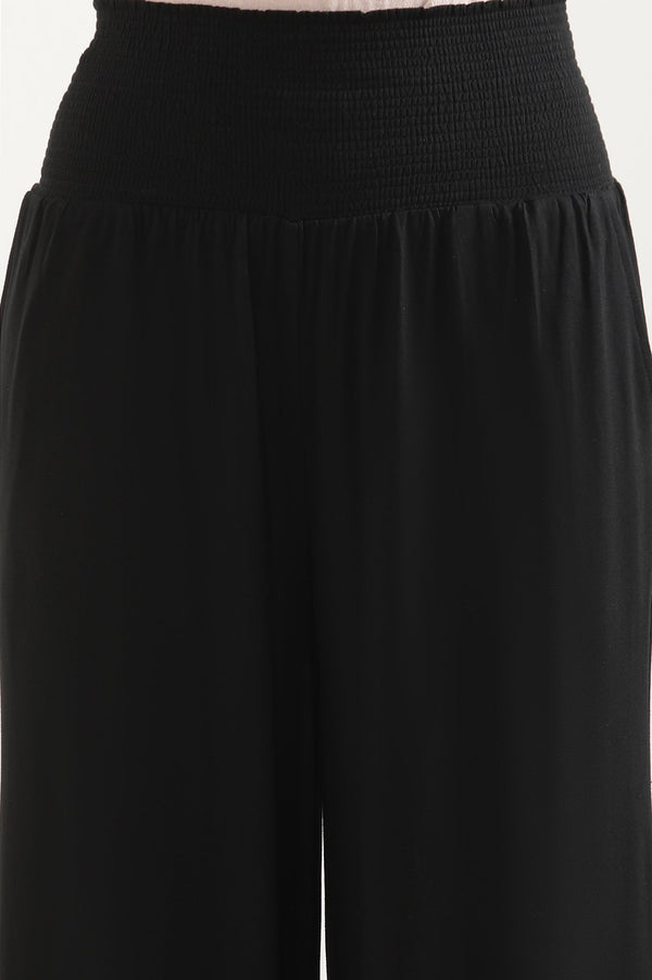Elleven Women's Black Solid Flared Pants With Smocked Waistbelt