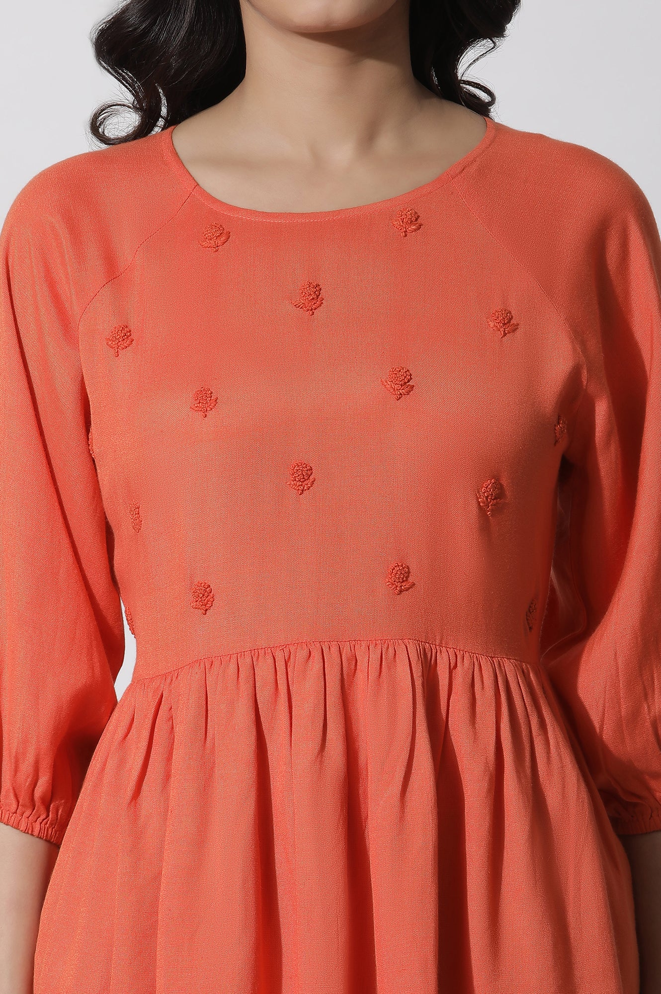 Buy Orange Embroidered Peplum Top Online for Woman | WforWoman