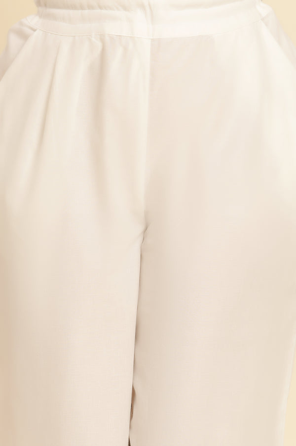 Ecru Solid Straight Pants With Embroidered Hemline