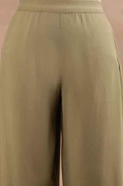 Green Sleeveless Solid Straight Kurta And Pants Set