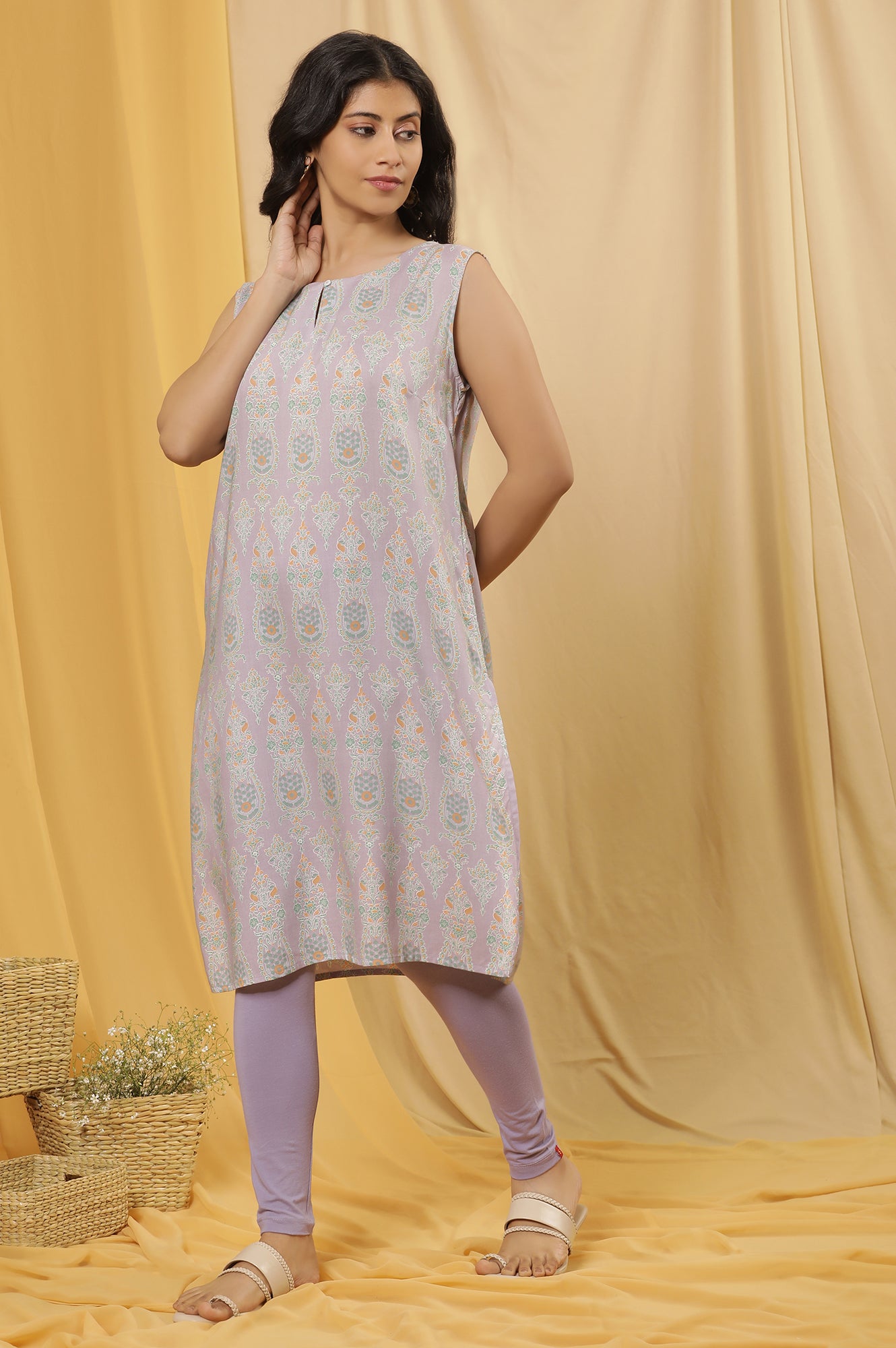 Purple Printed Sleeveless Kurta And Tights Set