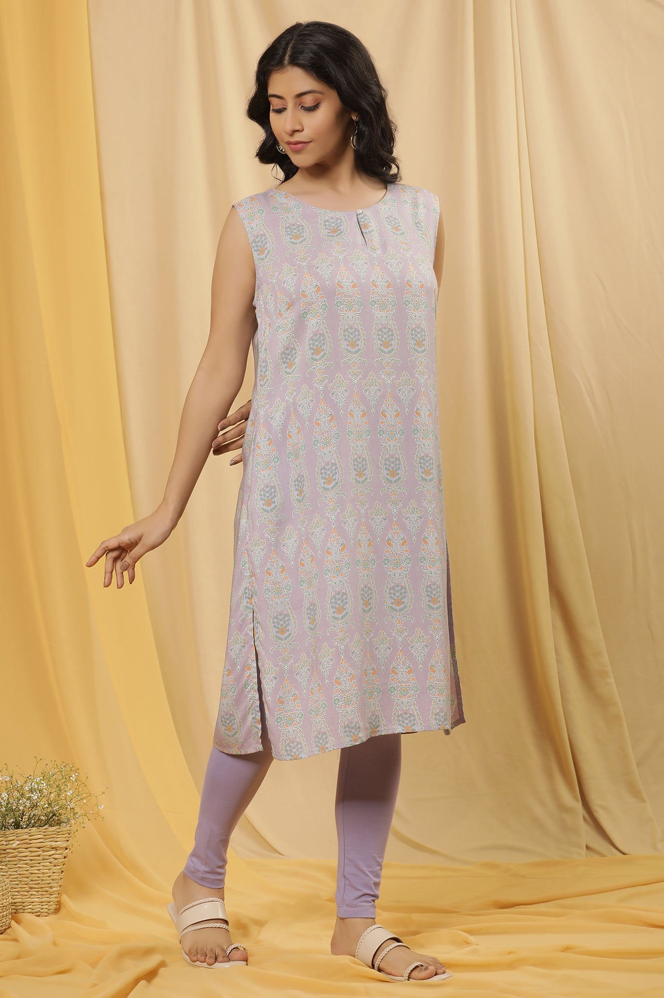 Purple Printed Sleeveless Kurta And Tights Set