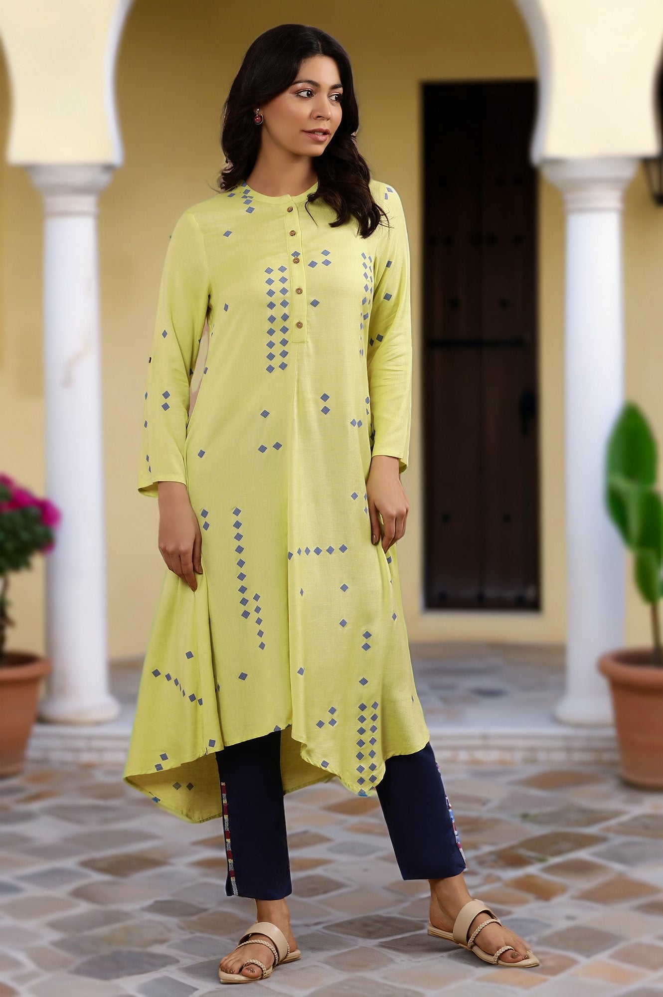 Green Printed Asymmetrical Kurta And Blue Slim Pants Set
