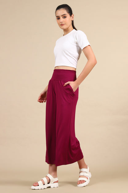 Purple Solid Flared Pants With Smoked Waist