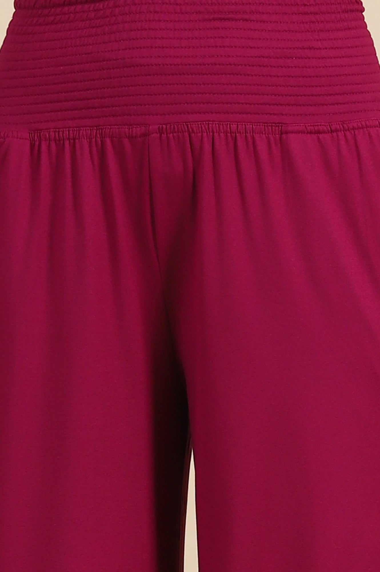 Purple Solid Flared Pants With Smoked Waist