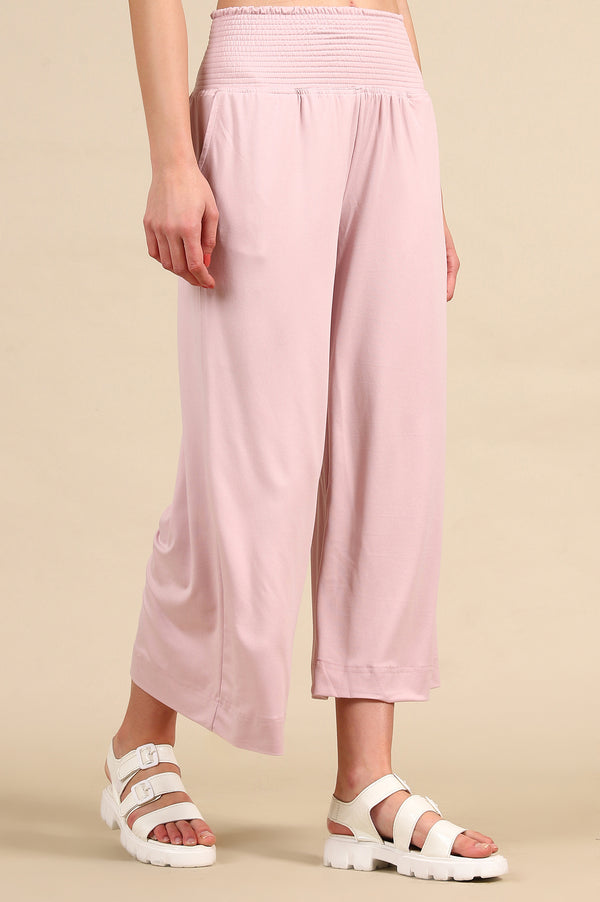 Elleven Women's Pink Solid Flared Pants With Smoked High Waisted Detail