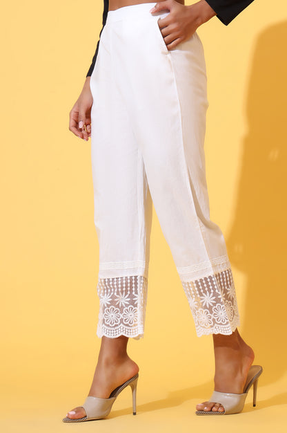 White Solid Pure Cotton Schiffli Embroidered Palazzo Pants