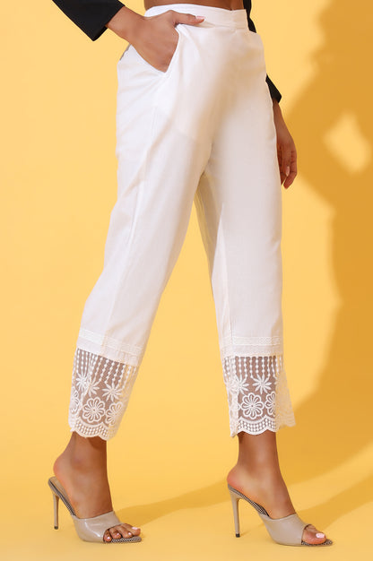 White Solid Pure Cotton Schiffli Embroidered Palazzo Pants