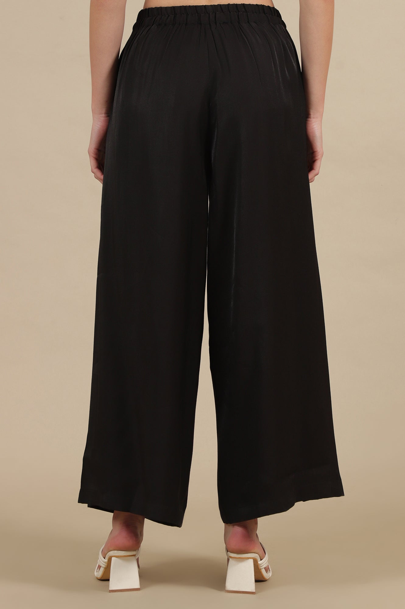 Black Solid Flared Rayon Palazzo With Pleated Detail