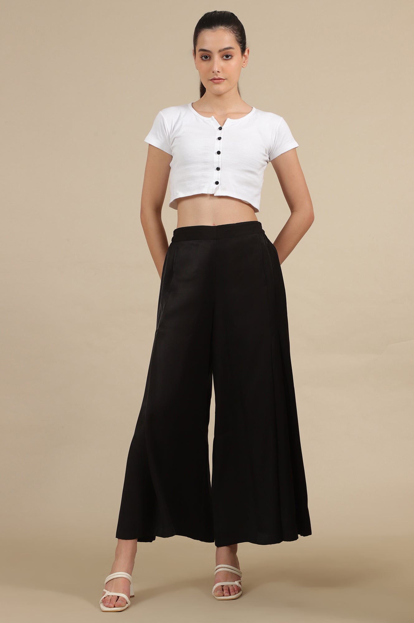 Black Solid Flared Rayon Palazzo With Pleated Detail