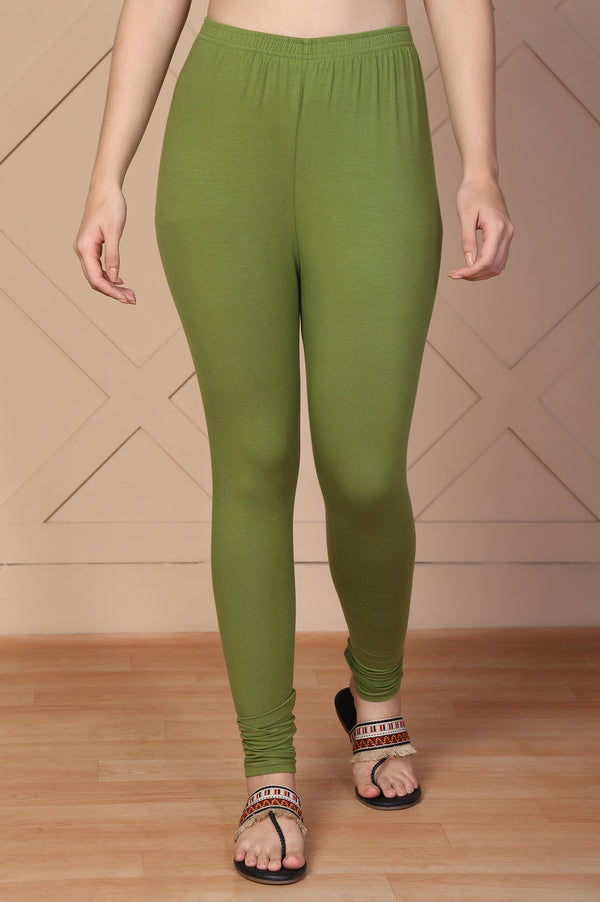 Elleven Women's Green Solid Churidar Cotton Tight
