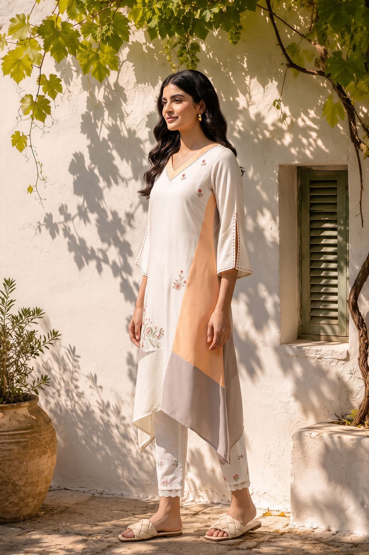 Off White Colourblocked Thread Embroidered Rayon A-line Kurta with Slim Pant Set