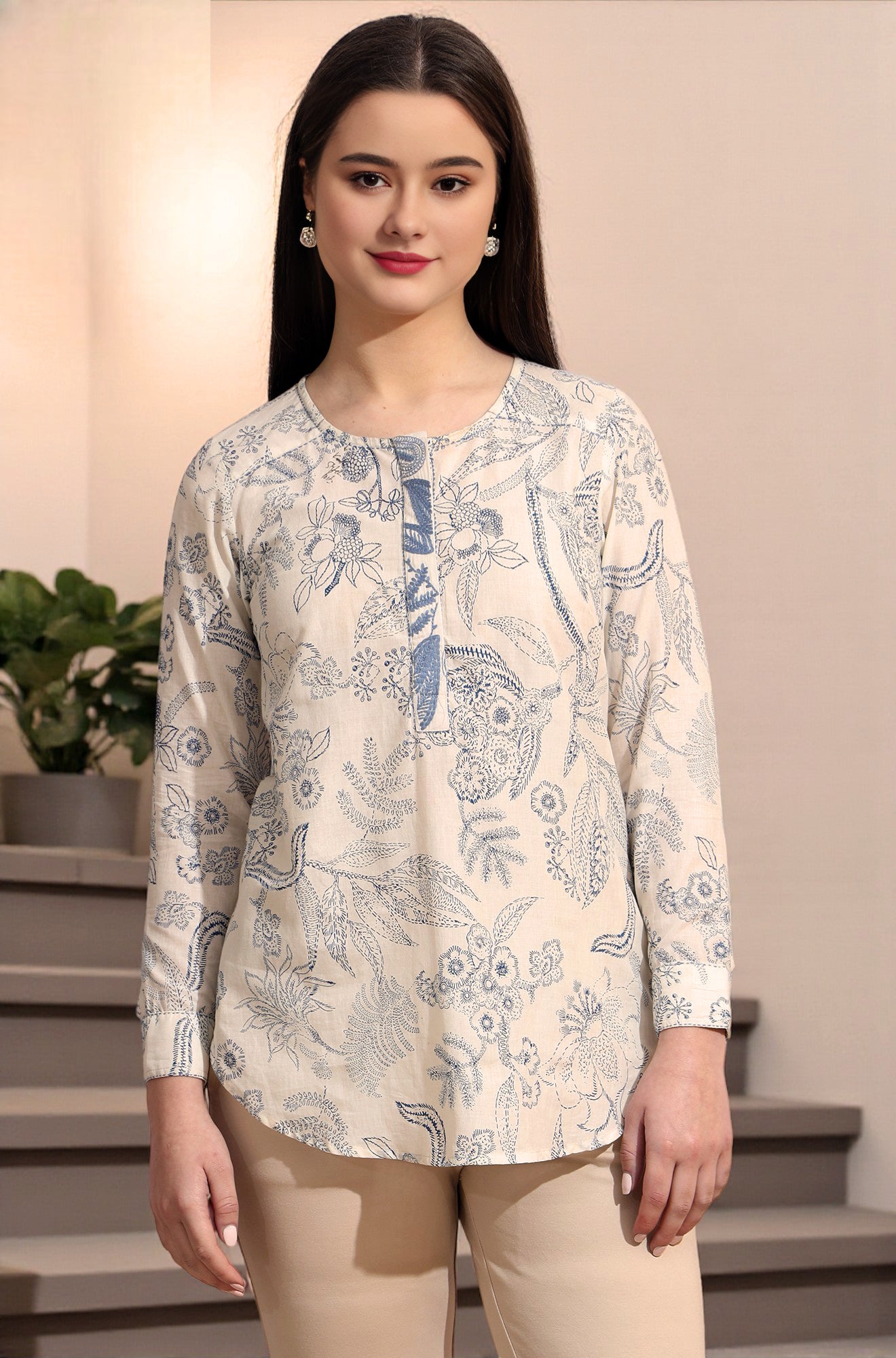 White and blue printed top with thread embroidery