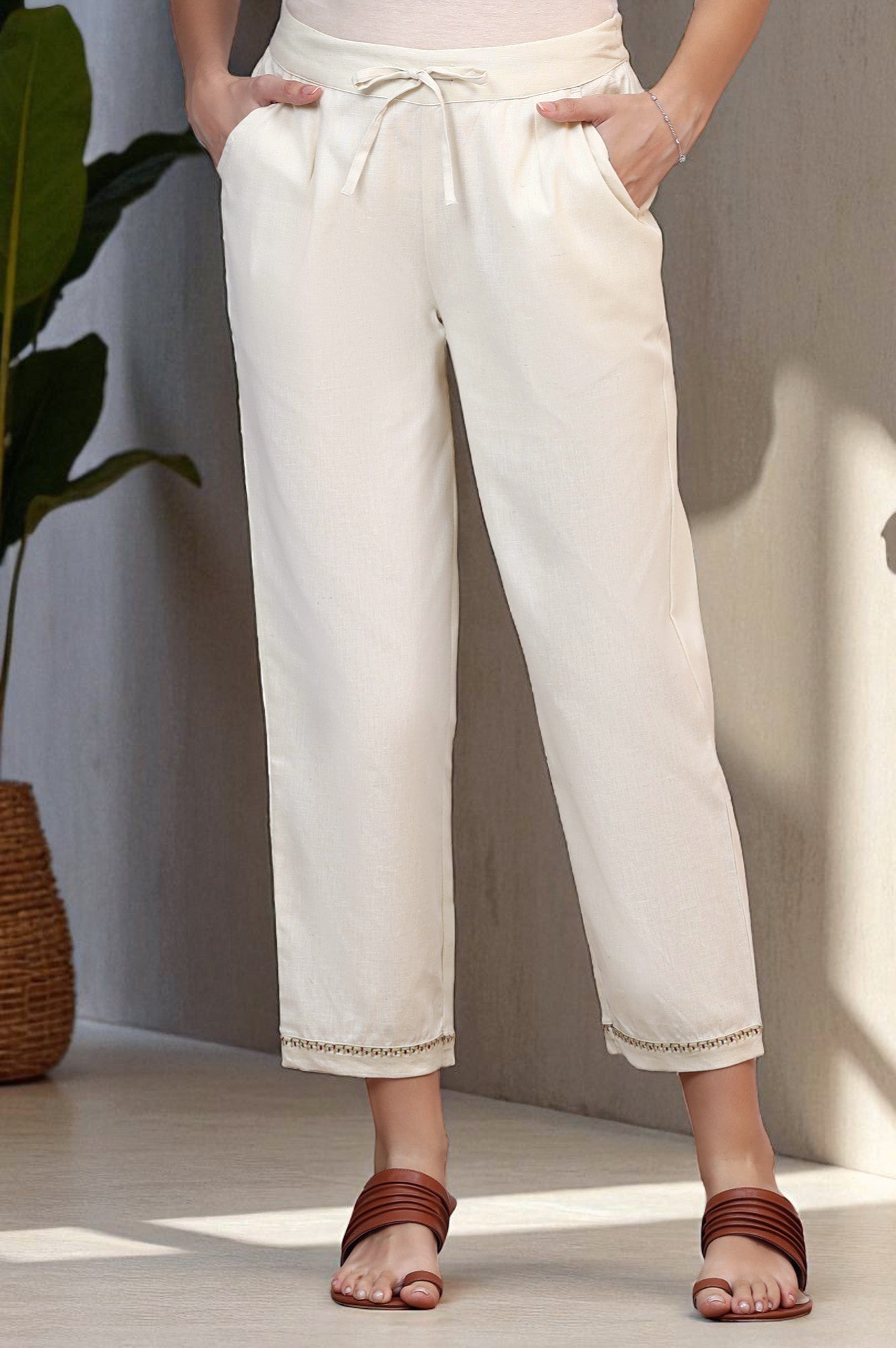 Off-White Solid Cotton Flax Straight Pants with Embroidered Hemline