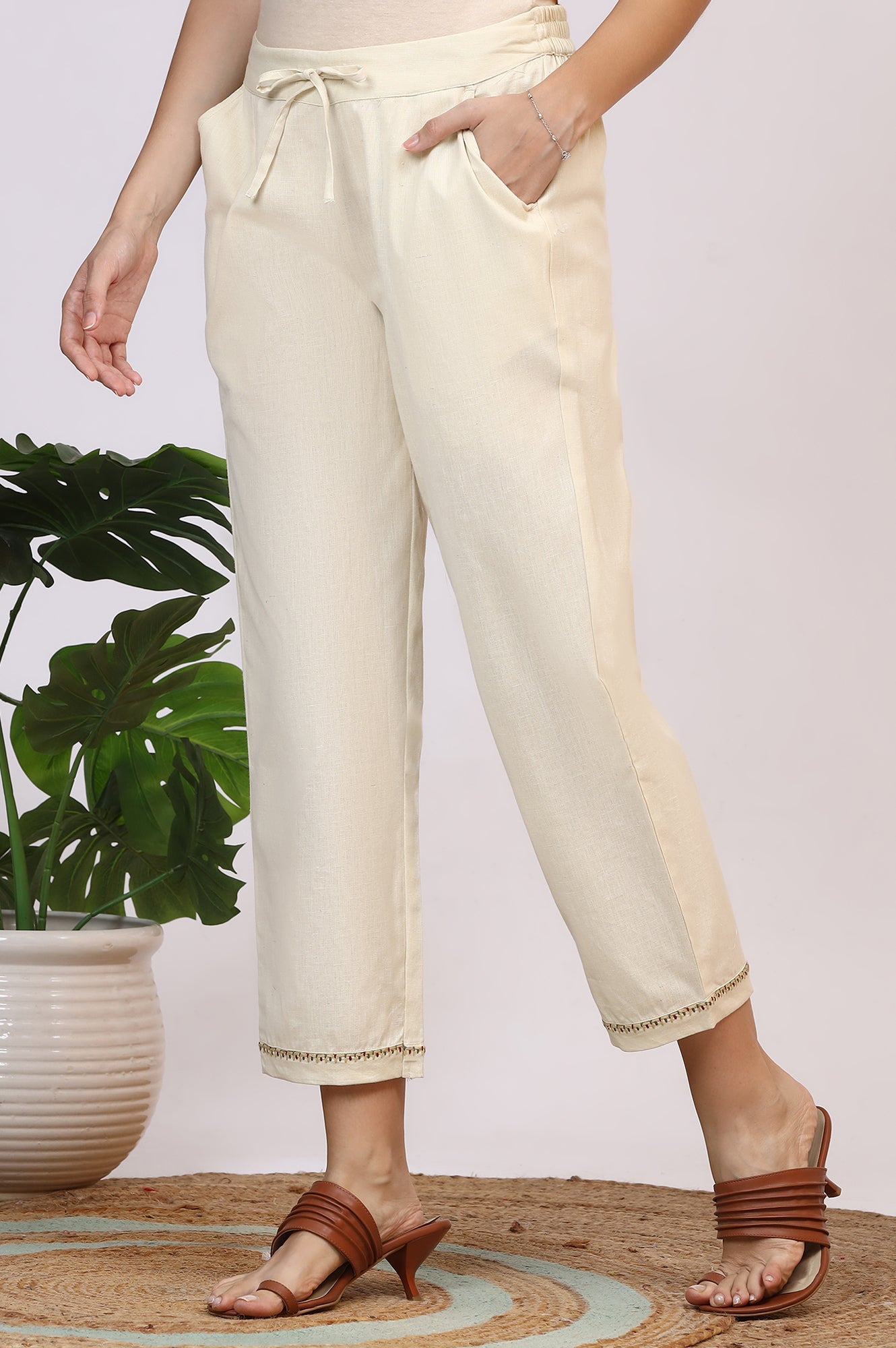 Off-White Solid Cotton Flax Straight Pants with Embroidered Hemline
