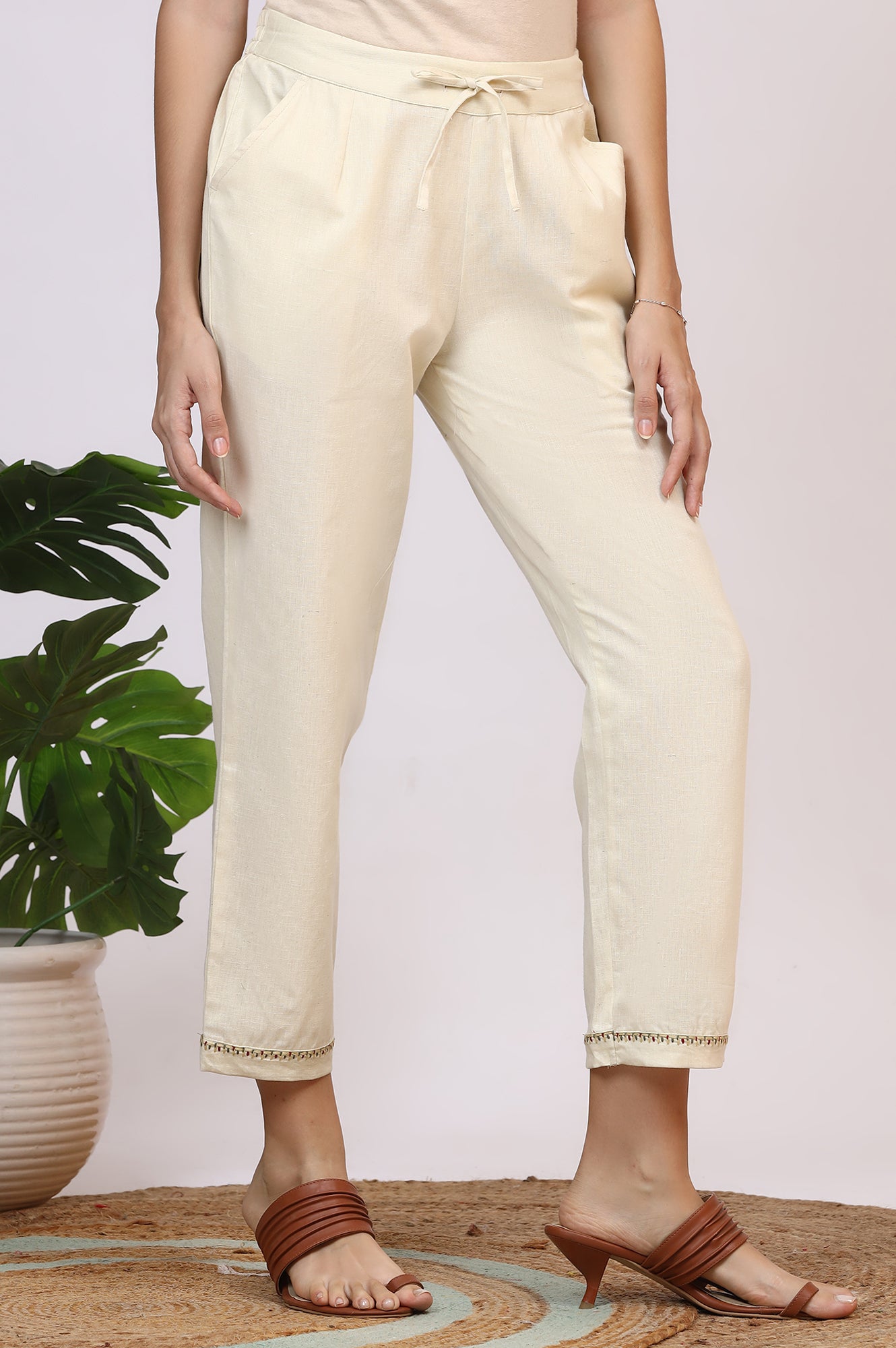 Off-White Solid Cotton Flax Straight Pants with Embroidered Hemline