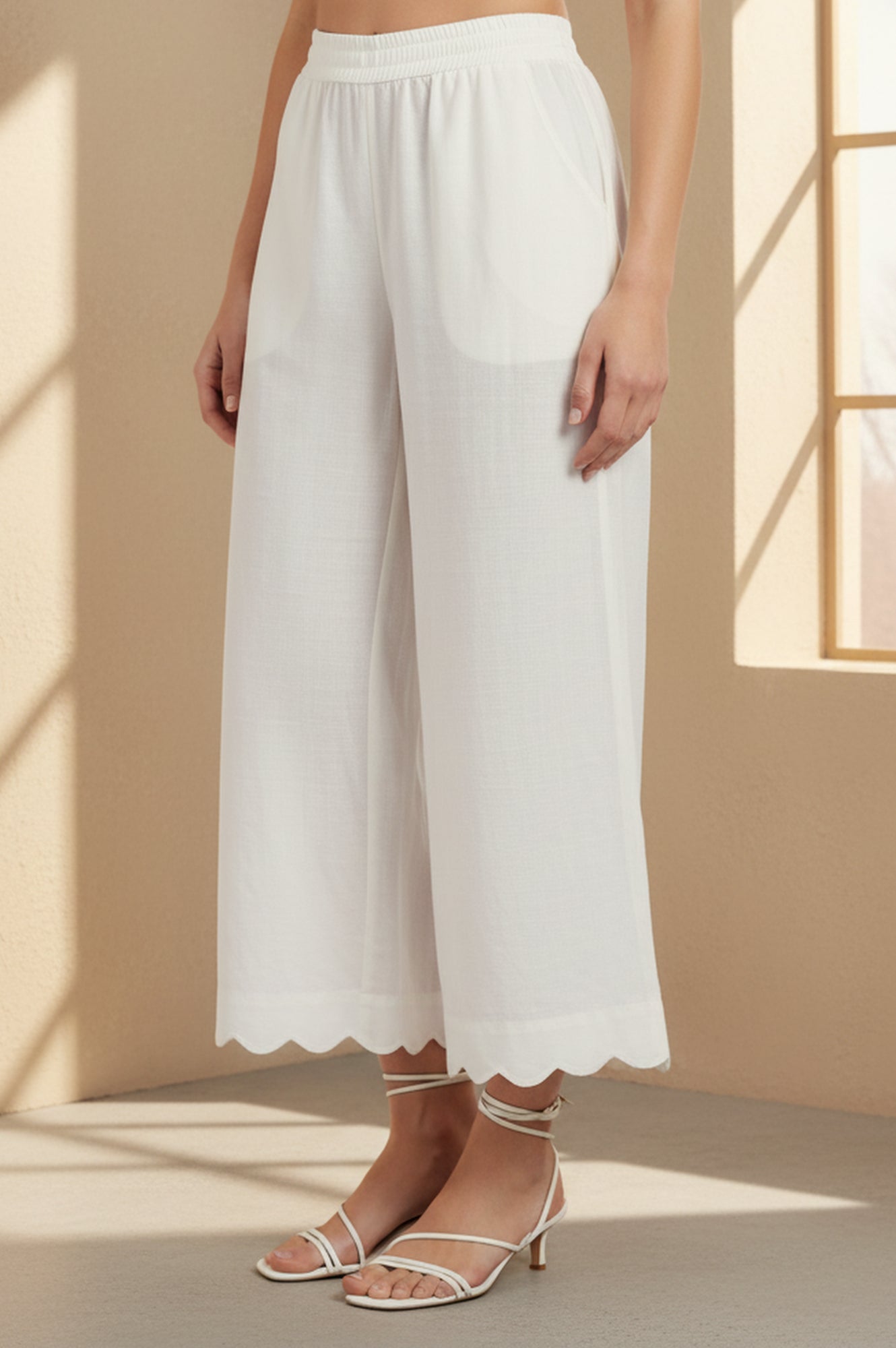 Off White Solid Cut Work Calf Length Flared Pants