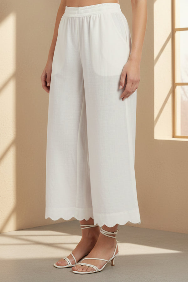 Off White Solid Cut Work Calf Length Flared Pants