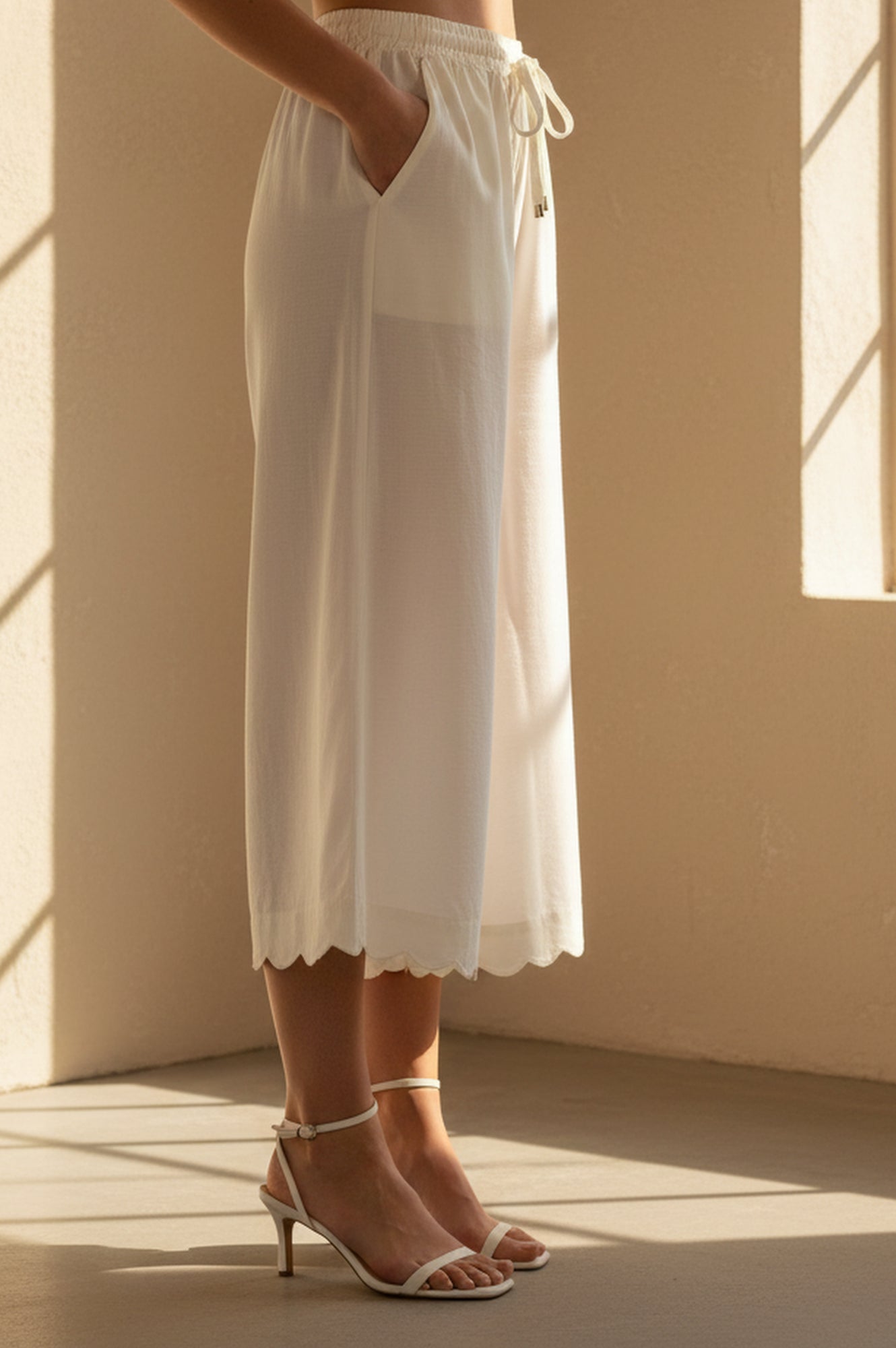 Off White Solid Cut Work Calf Length Flared Pants