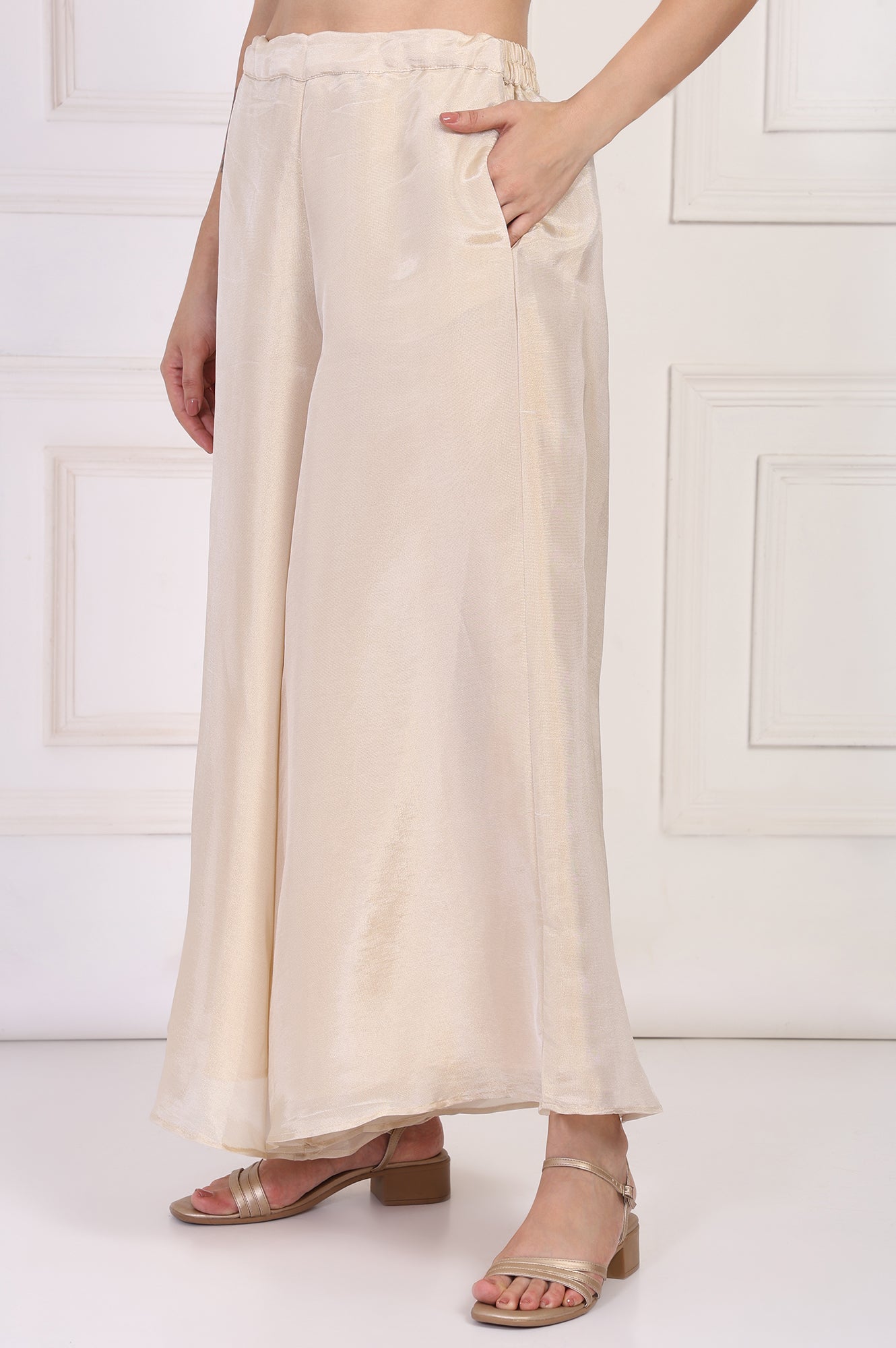 Cream Textured Flared Tissue Pant